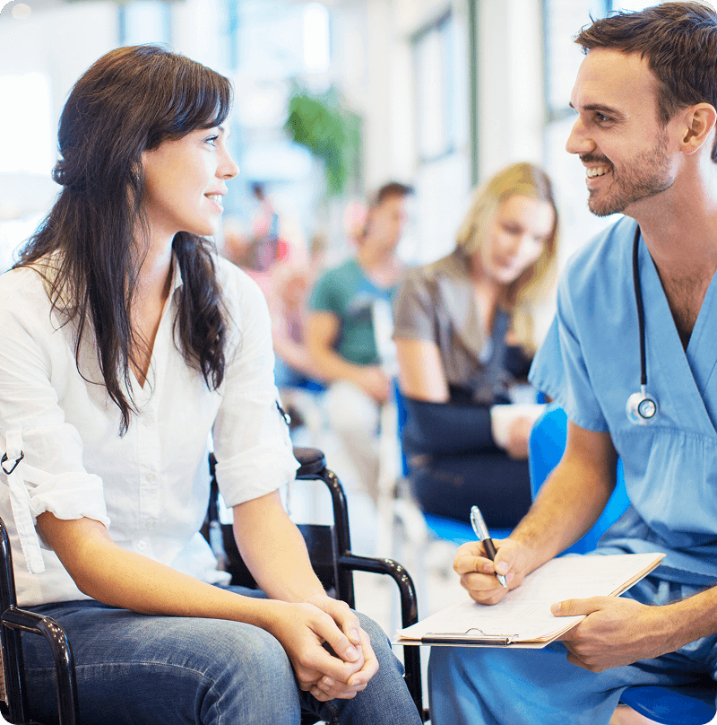 Patient and doctor discussing medical notes.