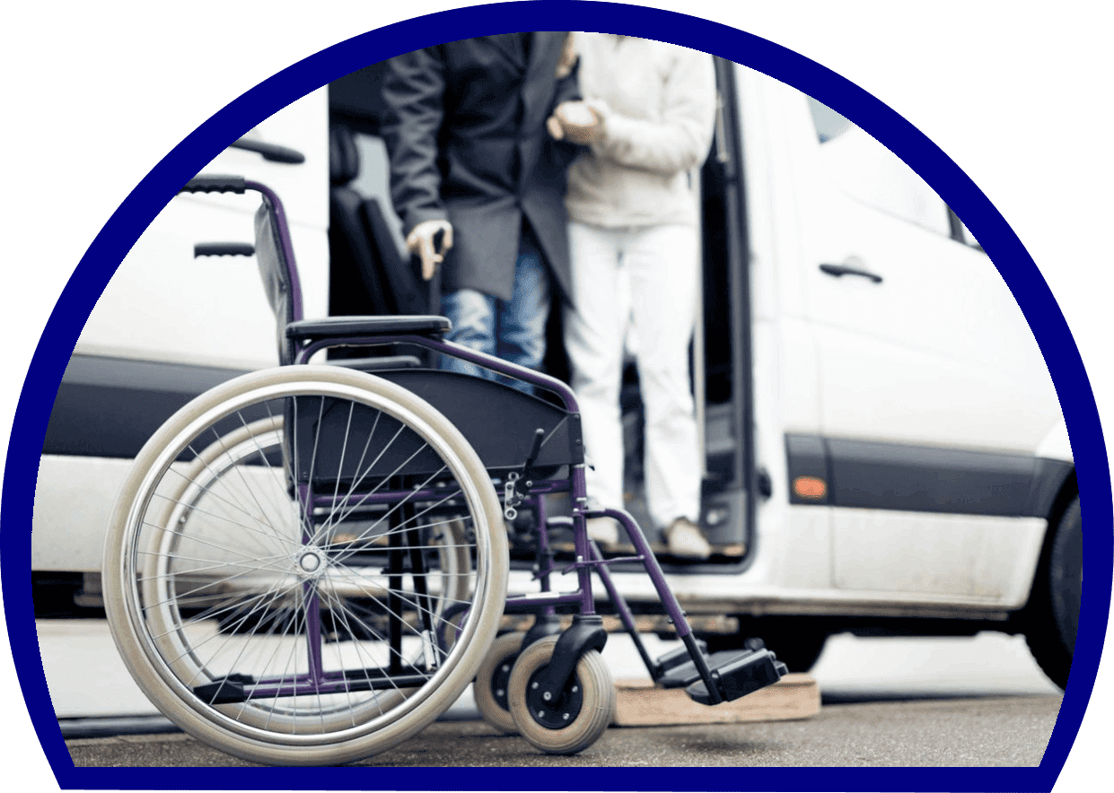 Wheelchair near accessible van with individuals.